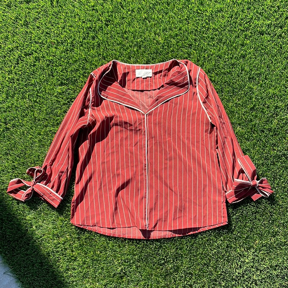 Quarter sleeve striped top